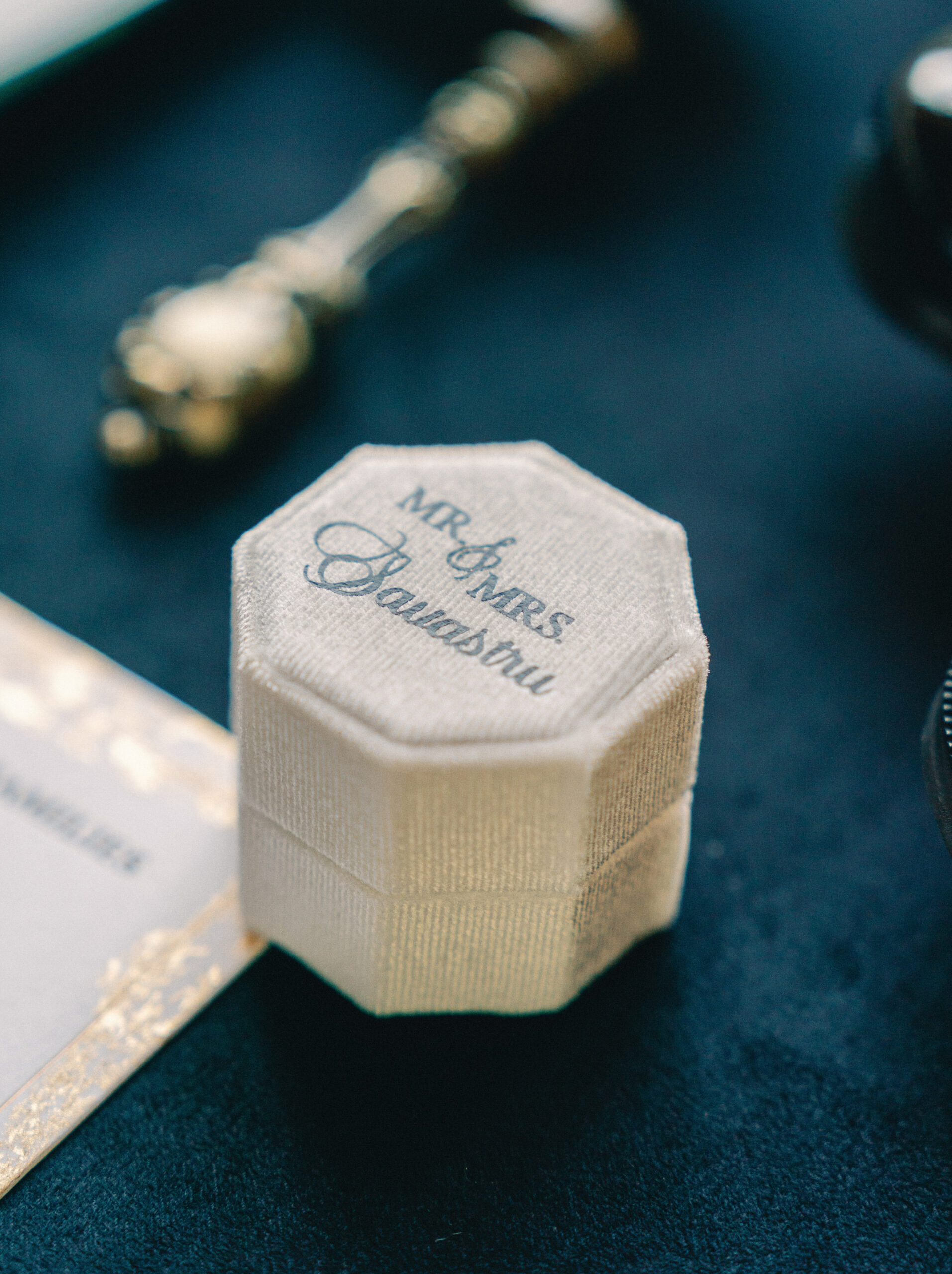 Wedding ring box on blue fabric