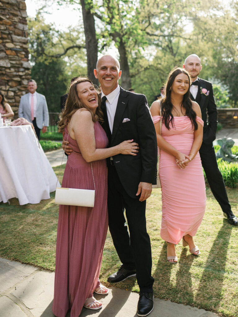 Wedding guests enjoying a relaxed cocktail hour during a multi-day destination wedding weekend