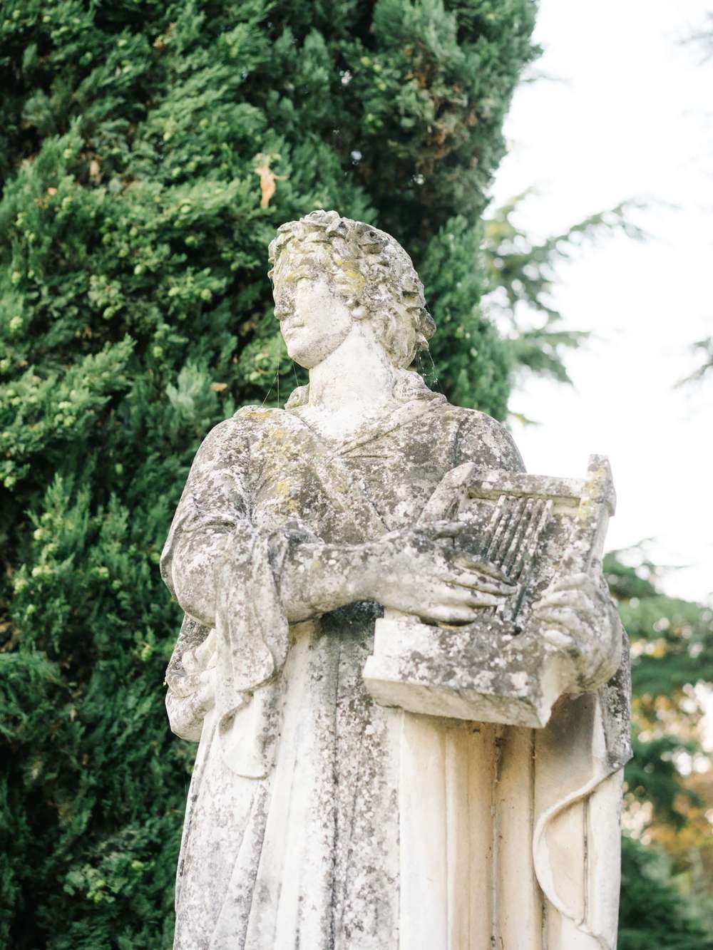Garden statue detail for wedding venue atmosphere