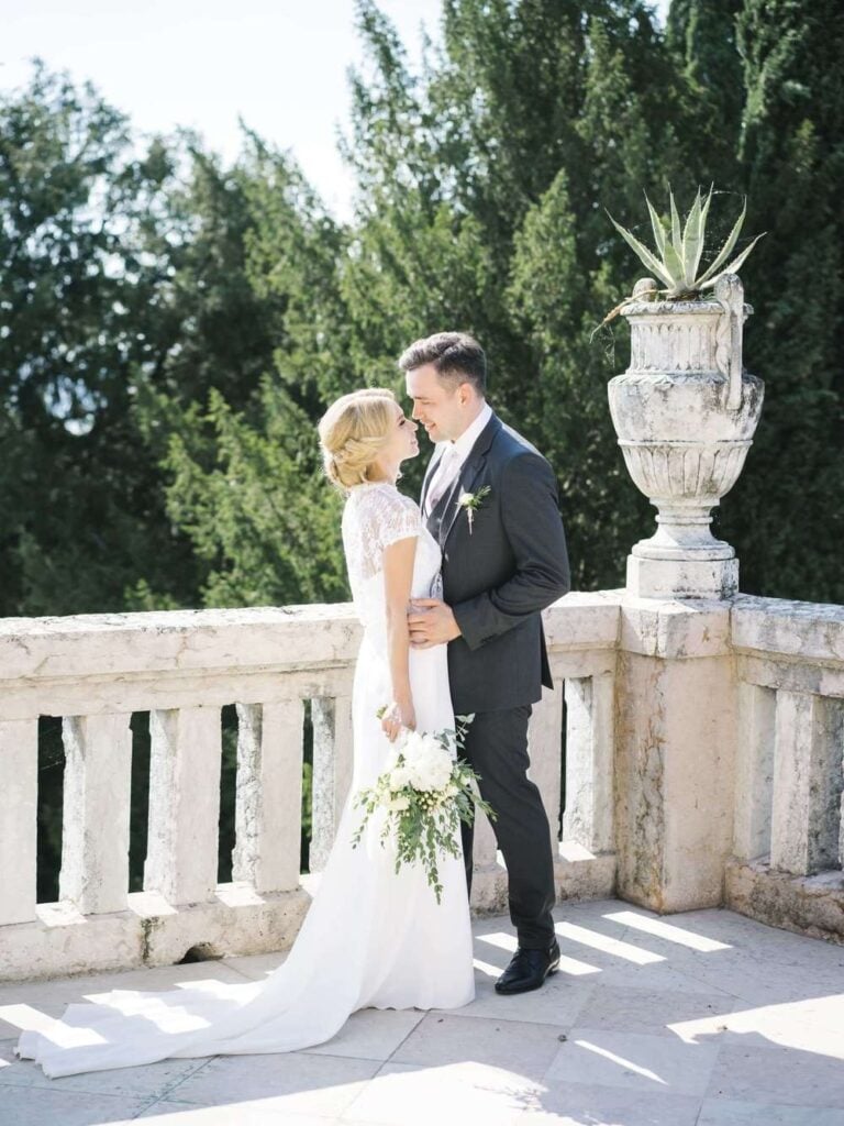 Couple portrait in refined destination wedding light