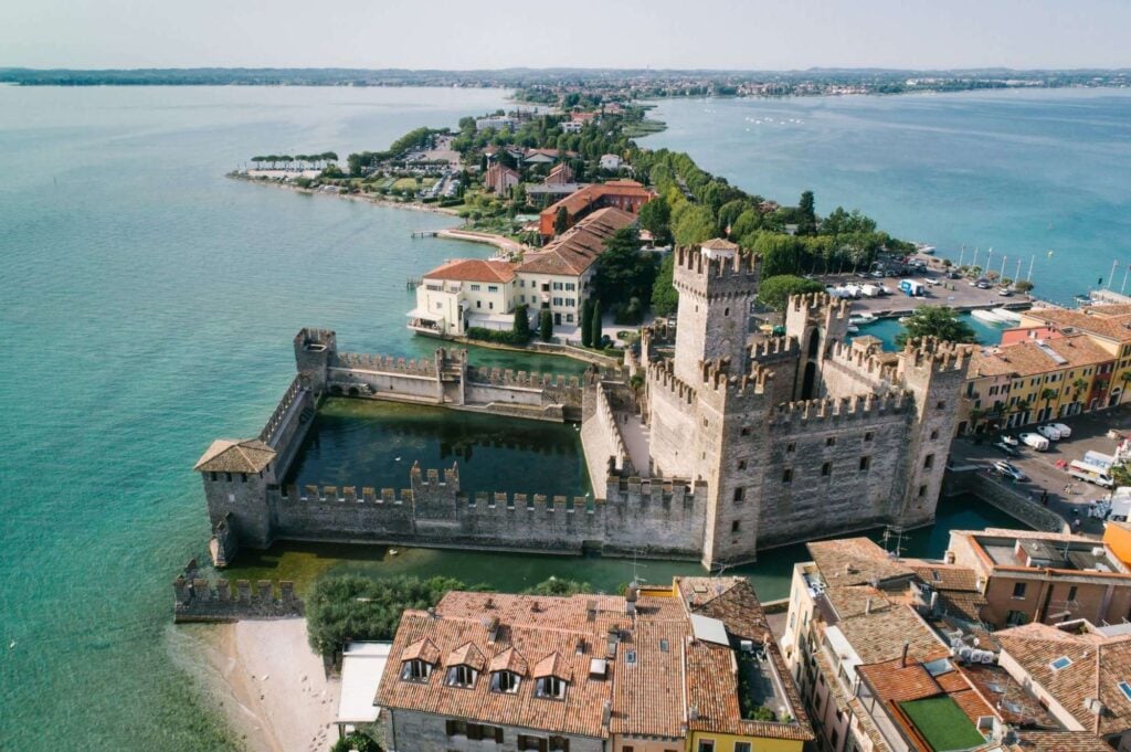 Historic lakeside castle and wedding venue setting