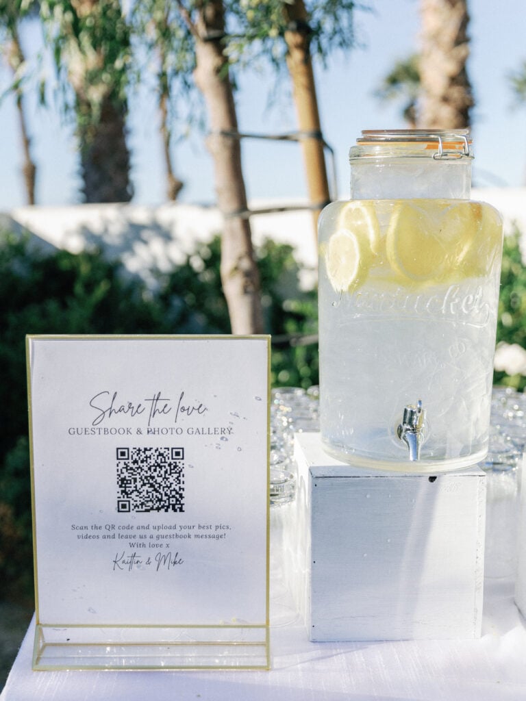 Stylish wedding welcome station with welcome drinks and guest amenities at a luxury destination villa
