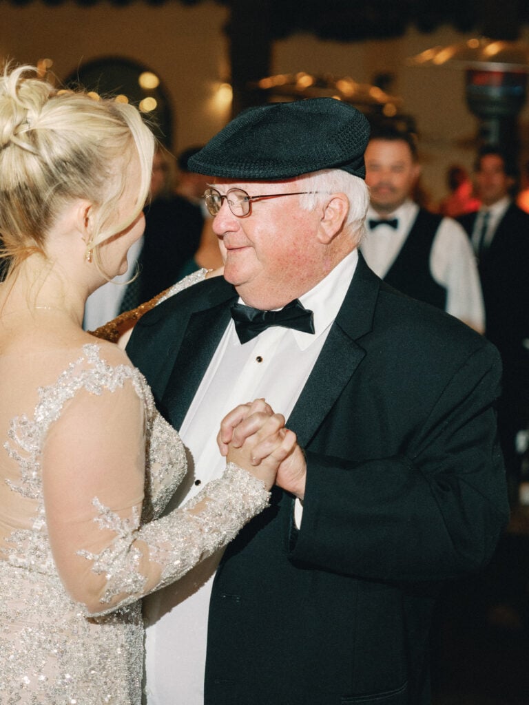 Bride sharing a heartwarming father-daughter dance at her wedding reception