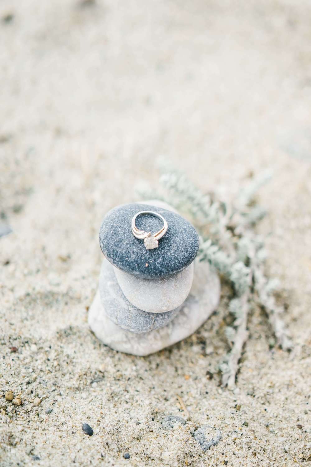 Wedding ring on textured stone detail