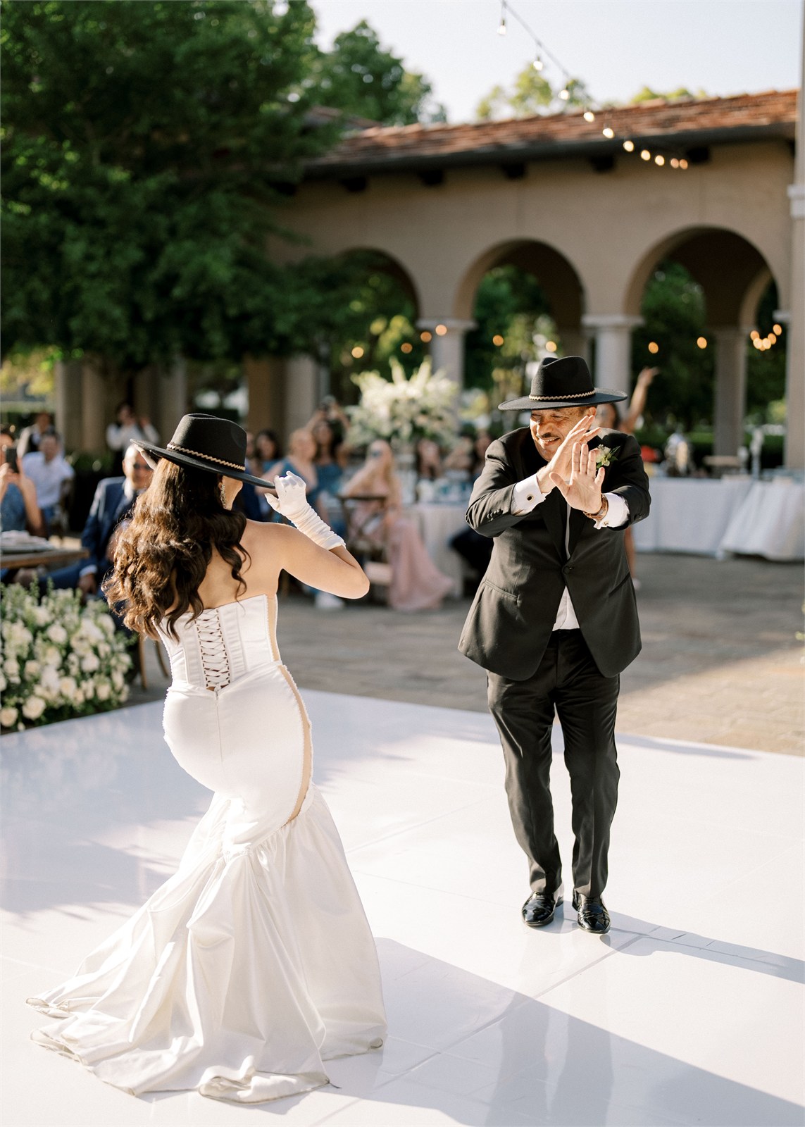 Couple dancing together during a wedding reception