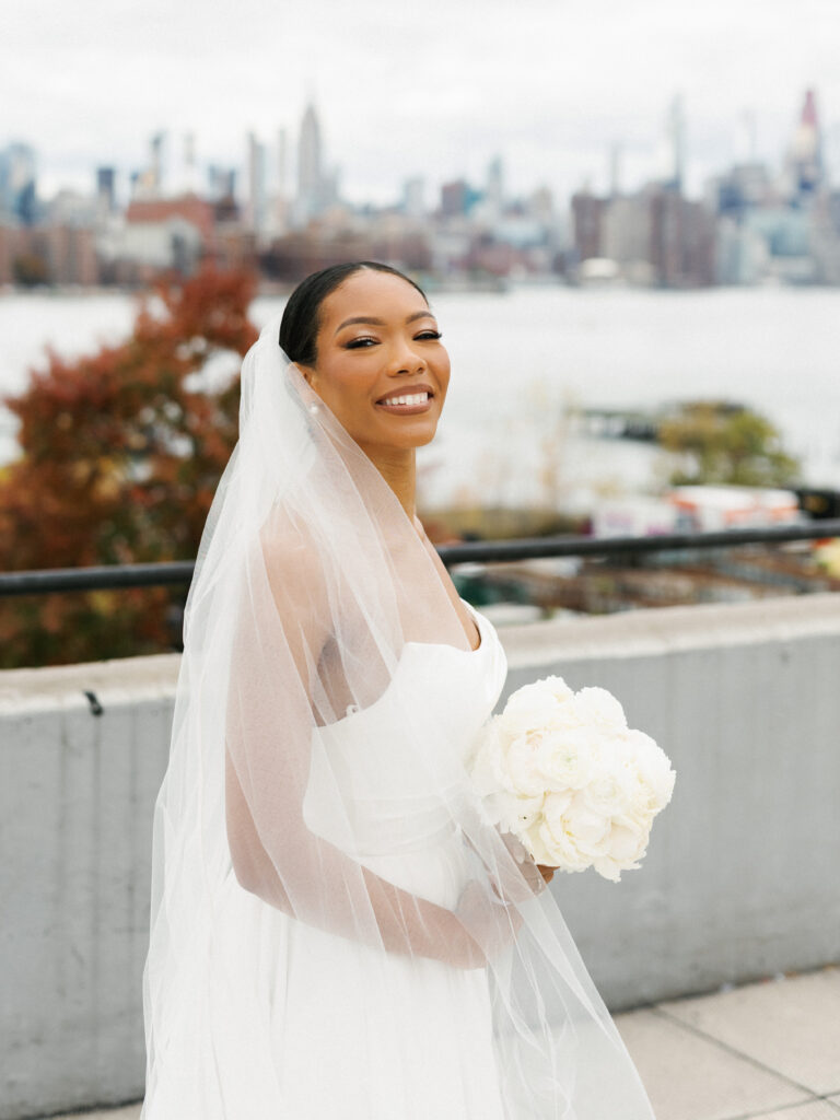 Luxury New York City wedding photography featuring a chic close-up bridal portrait on a Brooklyn rooftop terrace.