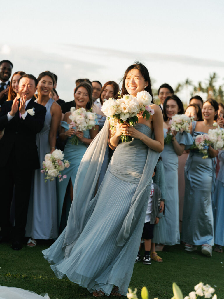 Candid wedding moments featuring a maid of honor holding a white peony bouquet at a luxury outdoor estate wedding reception.