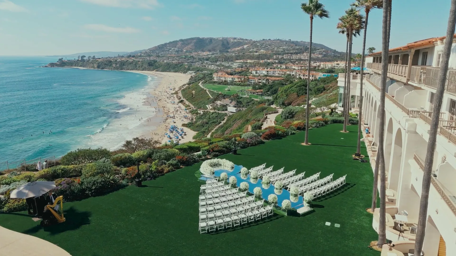 Coastal estate wedding ceremony setup overlooking the ocean