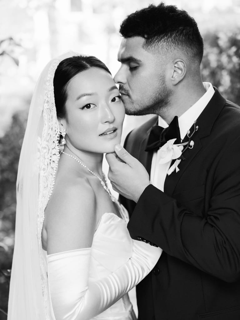 Black-and-white close portrait of a couple