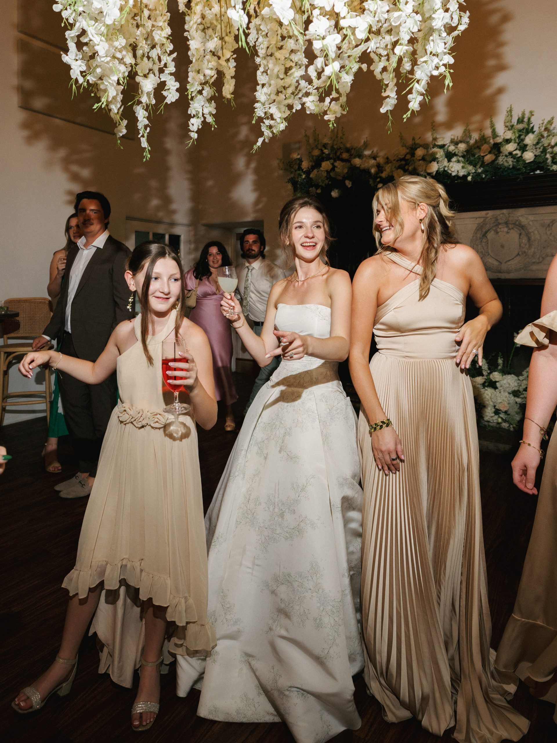 Baylee with wedding guests during the La Venta Inn reception