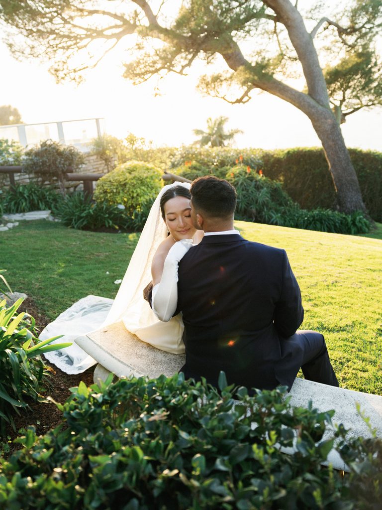 Scenic wedding portraits in a cliffside garden help couples find a destination wedding photographer