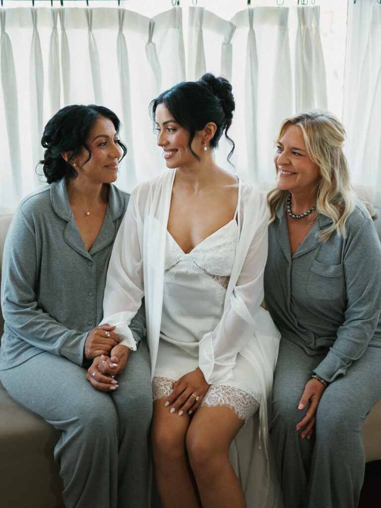 Loving family moments during an upscale destination wedding preparation hour