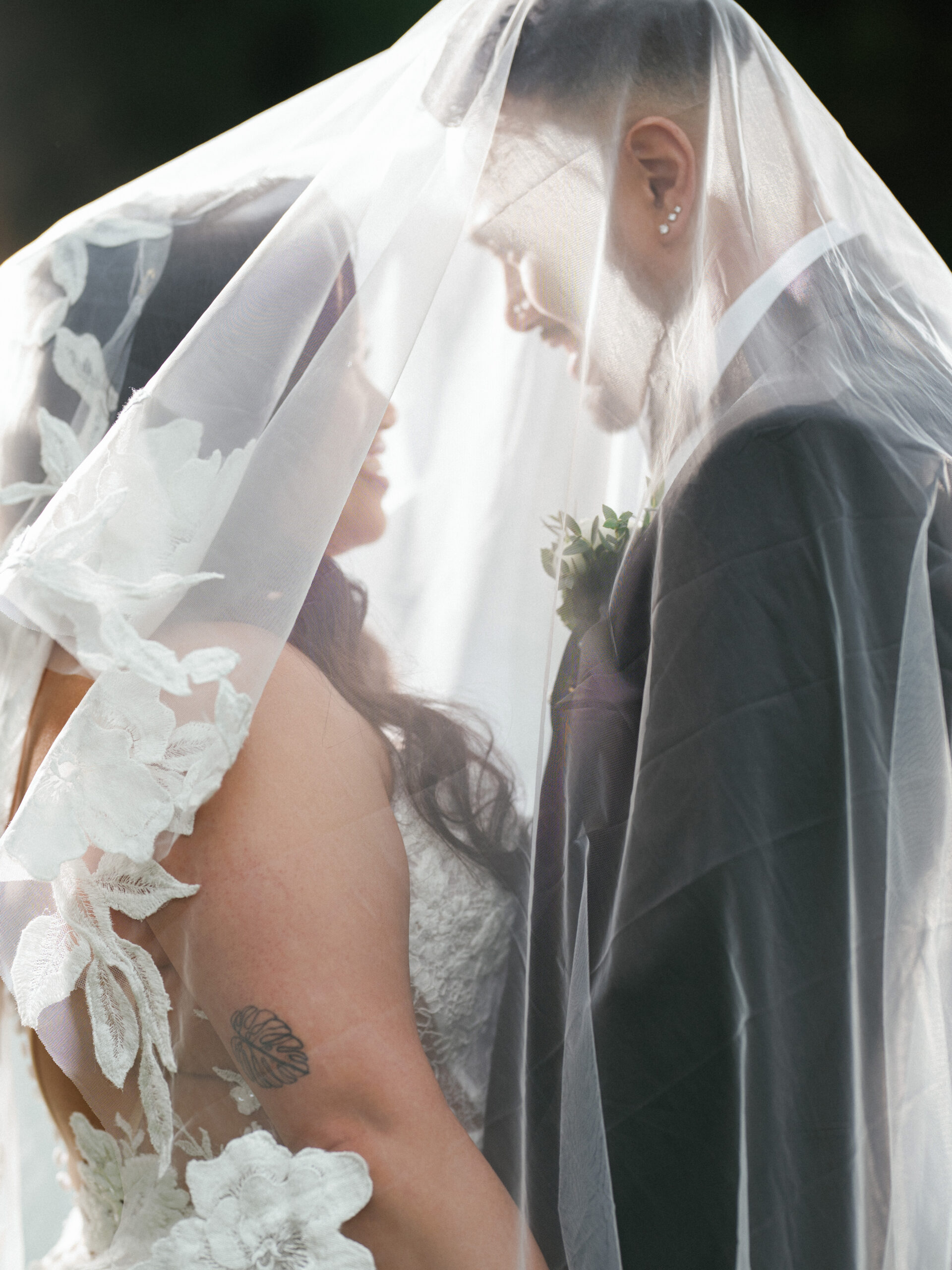A couple posing together in a wedding photograph