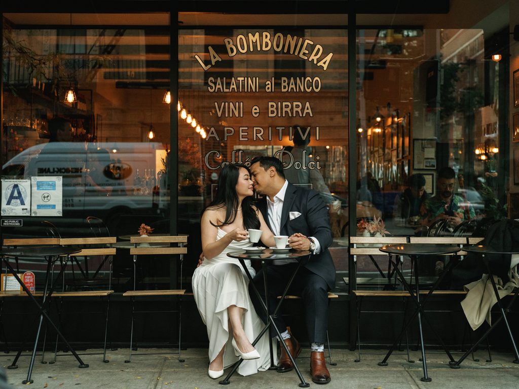 Outdoor cafe storefront photoshoot showcasing romantic and cinematic engagement photo ideas.