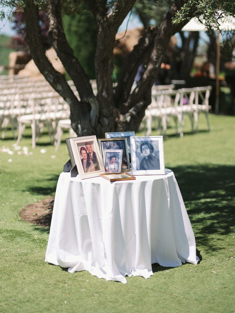 Memorial table setup illustrating the sentimental details included in a wedding photo gallery. 