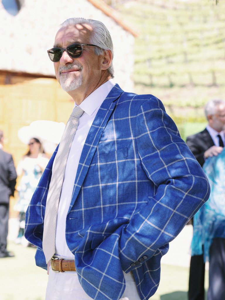 Elegant wedding guest portrait highlighting the candid moments in a premium wedding photo gallery. 