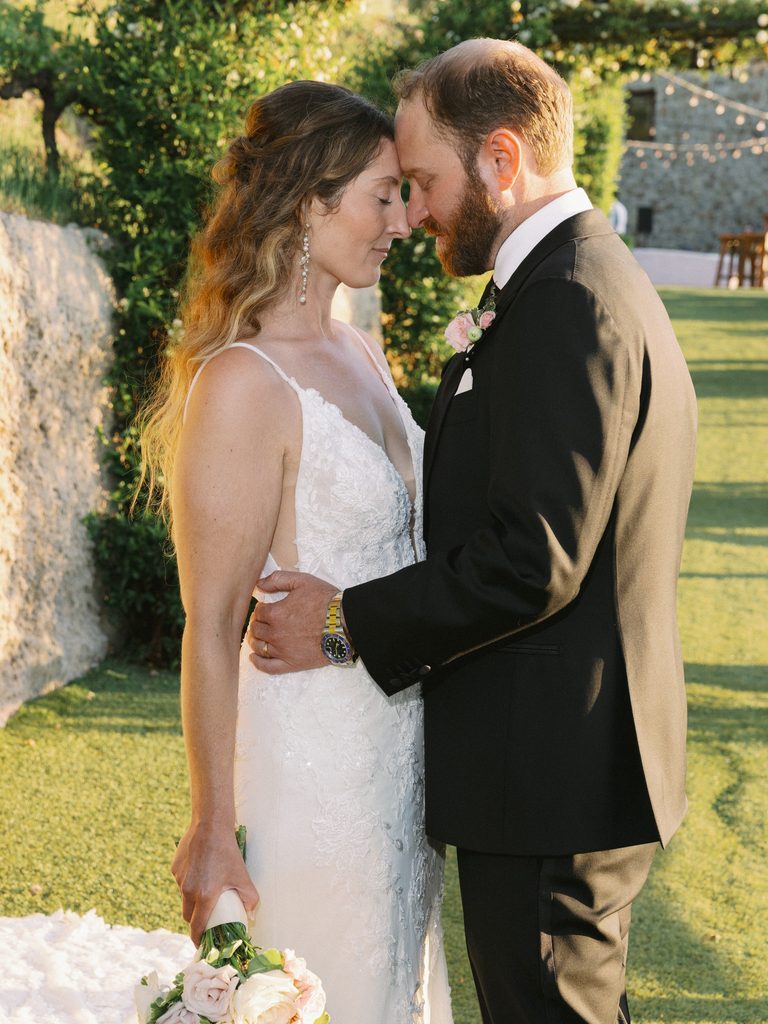 Candid golden hour wedding portrait illustrating natural interactions in a wedding photo gallery. 