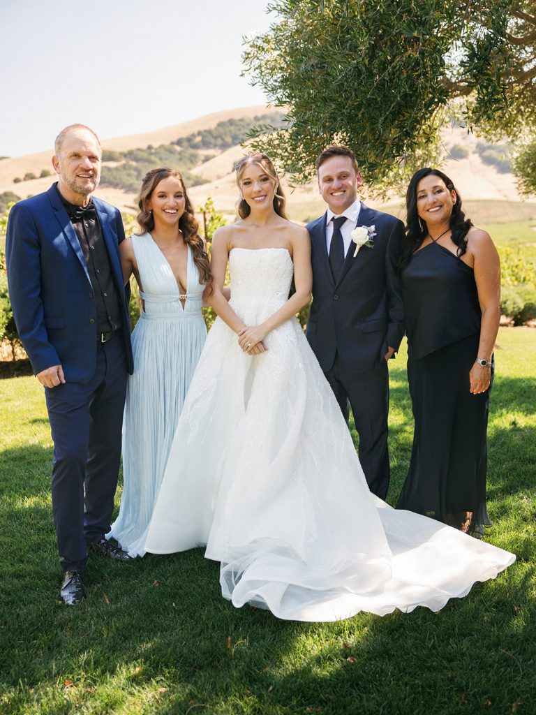 Elegant family wedding portraits outdoor with beautiful sunlit hills background inspiration