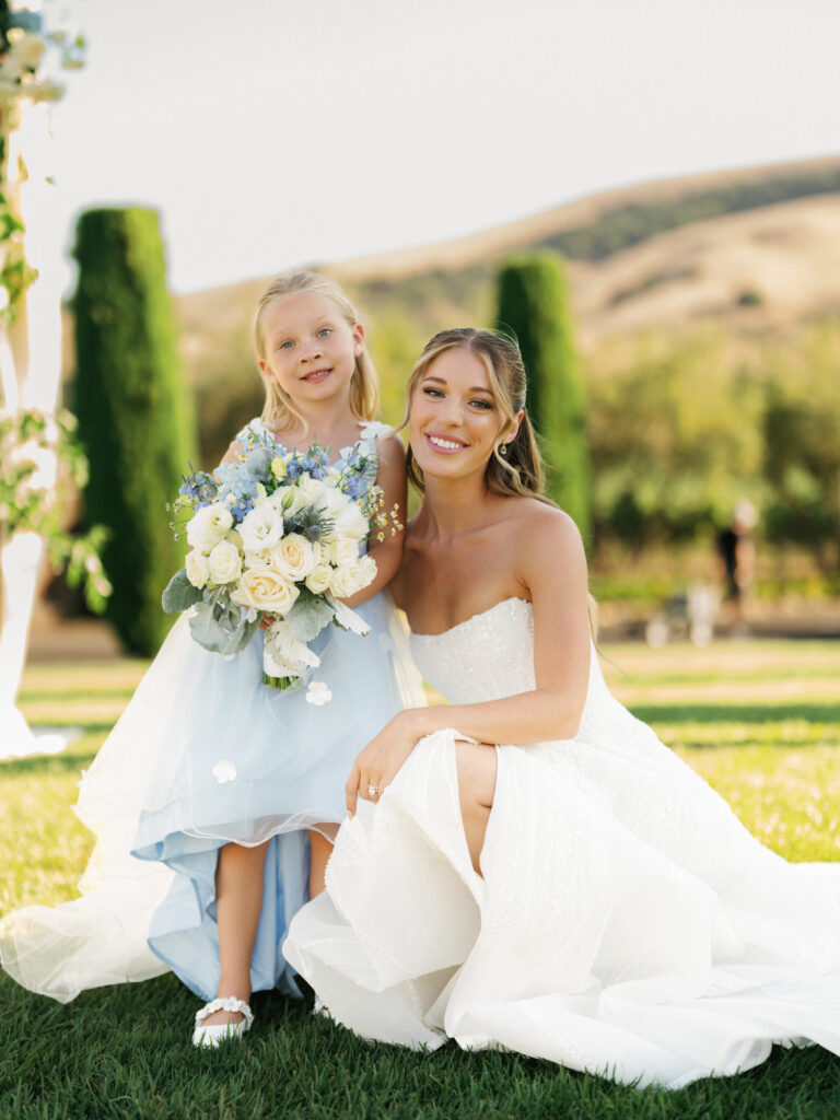 Happy bride with child at altar luxury California destination wedding gallery inspiration