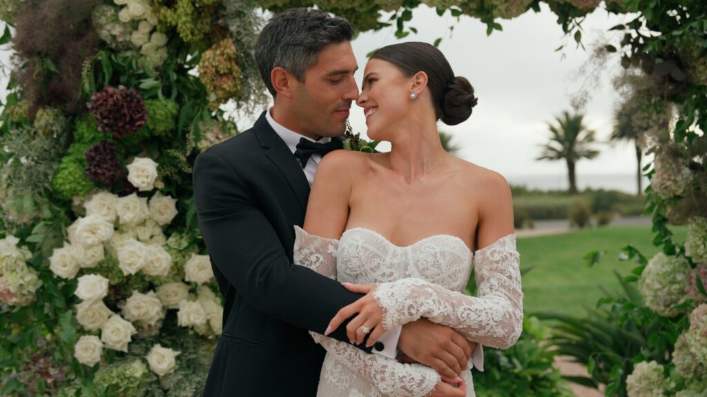 An outdoor wedding ceremony in Southern California. Royal Bee Flower Co. floral design.